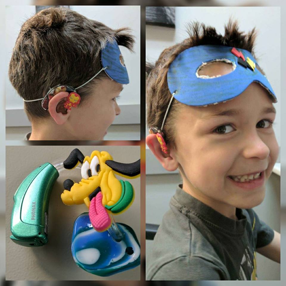 Boy with custom hearing aids