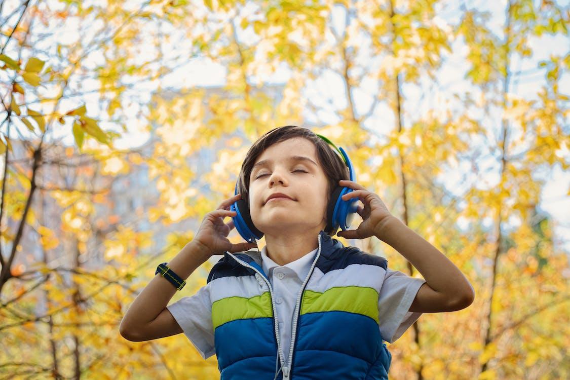 child hearing with headphones